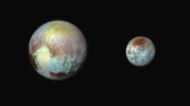 Pluto and Charon in exaggerated colour