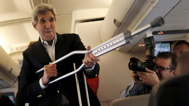 US Secretary of State John Kerry on board a flight to Vienna - 26 June 2015