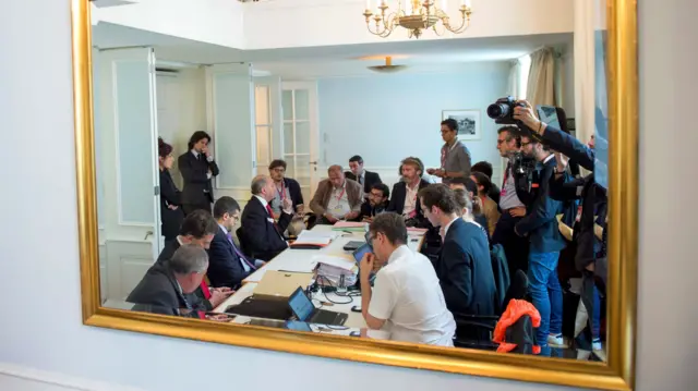 French Foreign Minister Laurent Fabius (fourth from left) briefs French journalists at Palais Coburg, the venue for nuclear talks in Vienna, Austria, on Tuesday