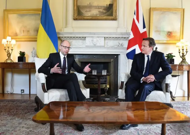 Ukrainian Prime Minister Arseniy Yatsenyuk (l) with David Cameron (r) at Downing Street