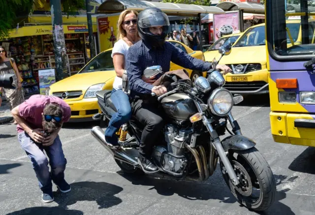 Yanis Varoufakis on a motorbike