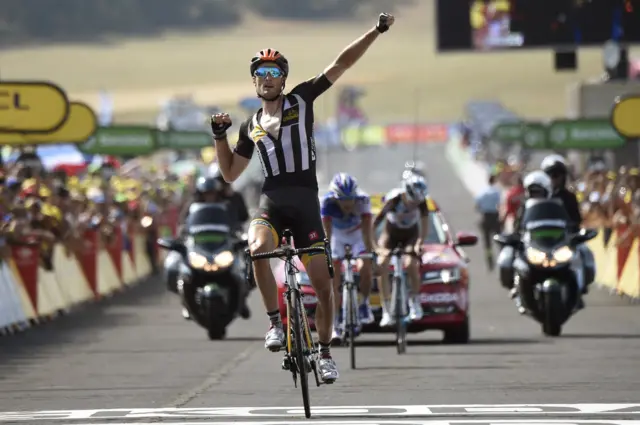 Stephen Cummiings crosses the line to win stage 14