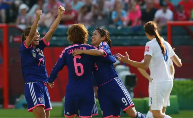 Japan's players celebrate