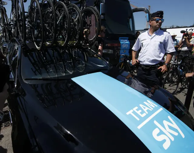 Police surround Team Sky bus ahead of stage 16