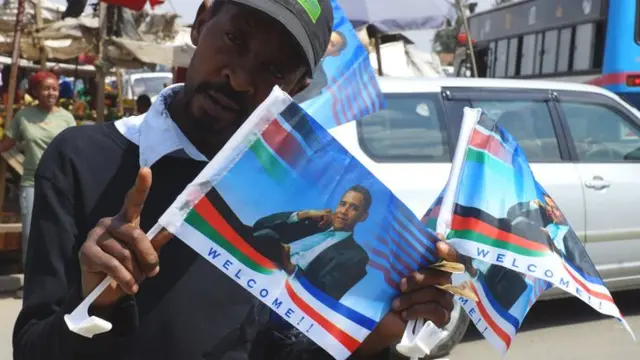 Man with Obama flags