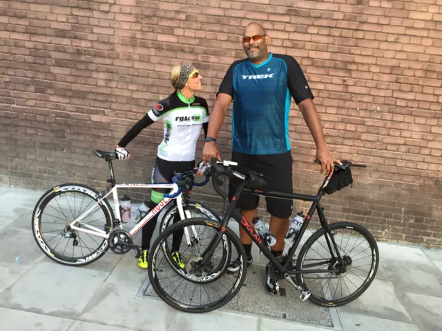 John Ameachi and his trainer with their bikes