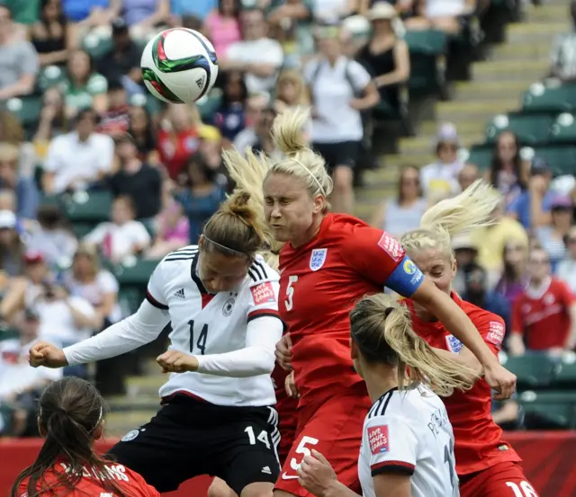 Steph Houghton heads clear