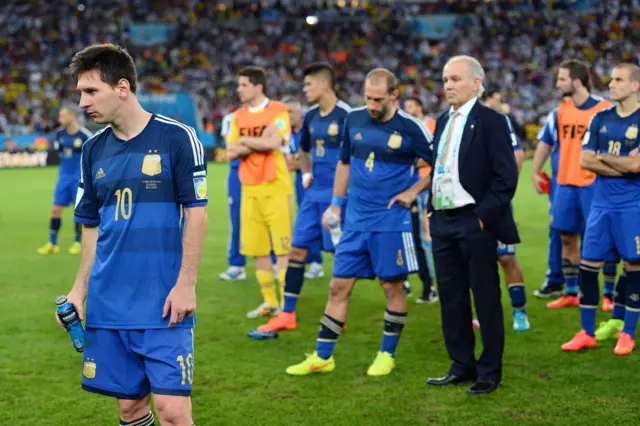 Lionel Messi and team-mates after defeat in the 2014 World Cup final