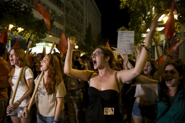 "No" supporters celebrate referendum results on a street in central in Athens, Greece 5 July 2015.