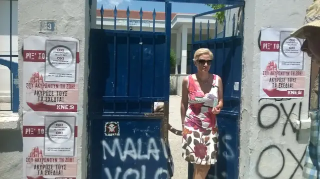 Voter outside polling station in Volos