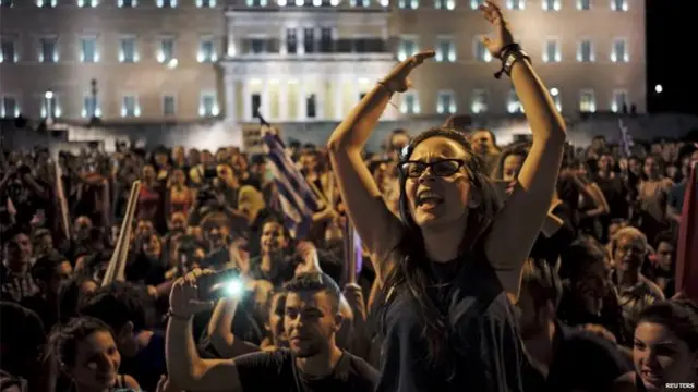 Greek people celebrating in the streets