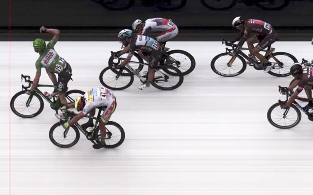 Andre Greipel crosses the line