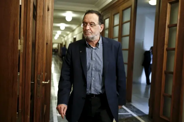 Minister of Productive Reconstruction, Environment and Energy Panagiotis Lafazanis arrives for a cabinet meeting at the parliament in Athens May 12, 2015