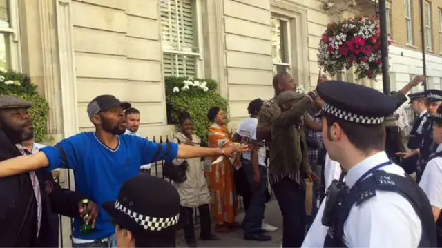 The scene outside the Rwandan High Commission in London