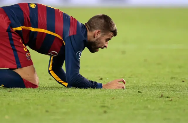 Gerard Pique bleeds