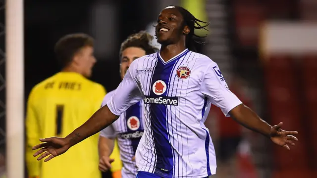 Romaine Sawyers celebrates