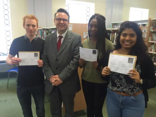 Huw Lewis with students at Bassaleg School