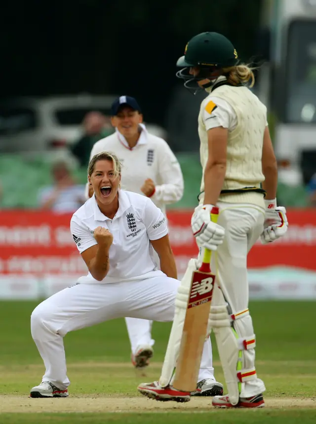 Brunt celebrates taking a wicket