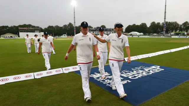 England players leave the field