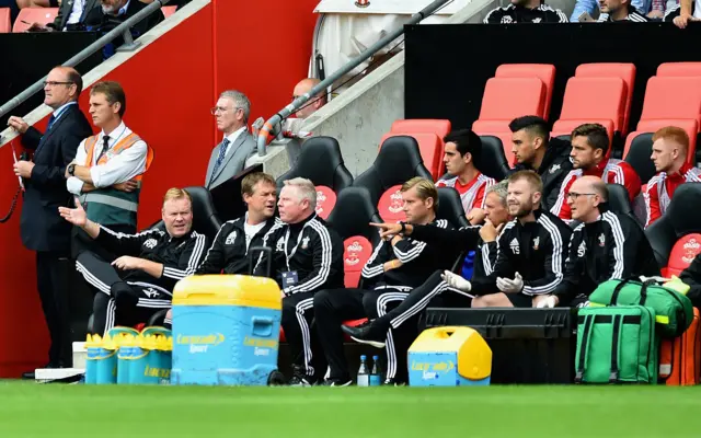 Ronald Koeman and his bench look on