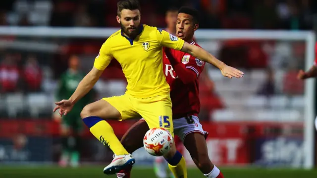 Stuart Dallas of Leeds and Callum Robinson of Bristol City