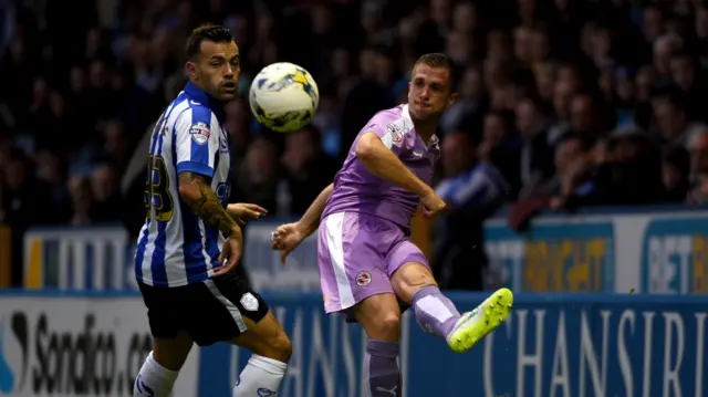 Andrew Taylor of Reading and Ross Wallace of Sheffield Wednesday