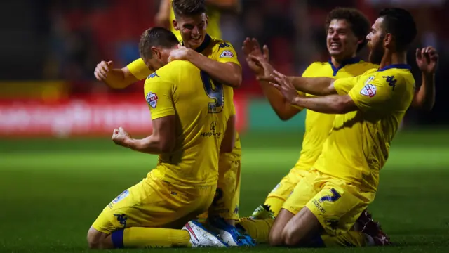 Leeds United players celebrate