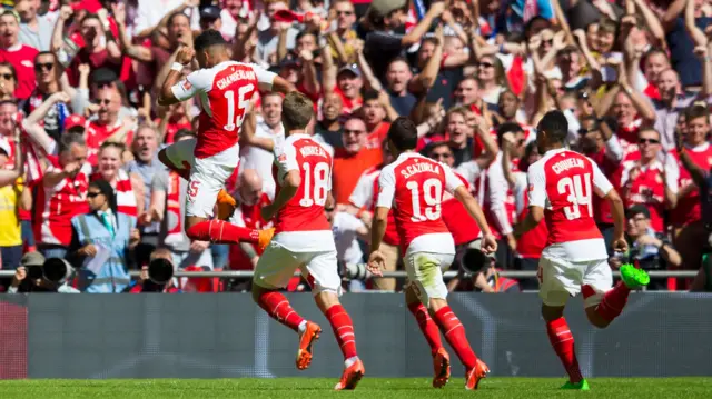 Alex Oxlade-Chamberlain celebrates