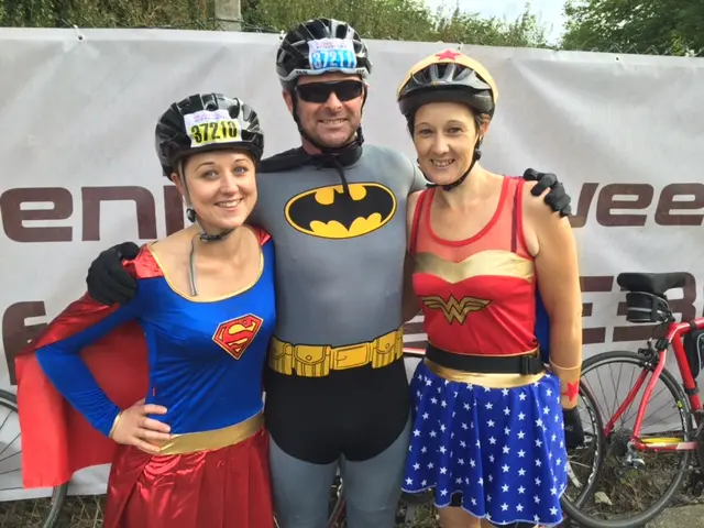 Dressed as superheros at the start line