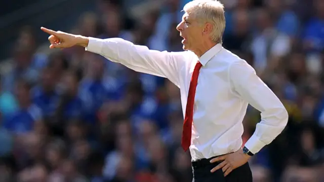 Arsene Wenger gestures