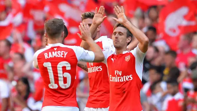 Arsenal players celebrate