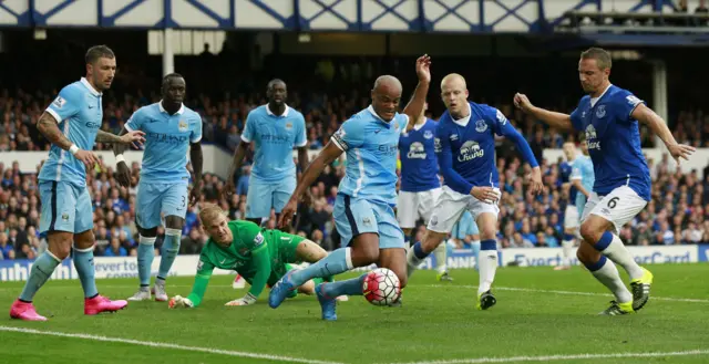 Vincent Kompany makes a goal line clearance