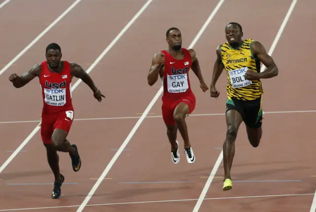 Justin Gatlin stumbles under pressure from Usain Bolt