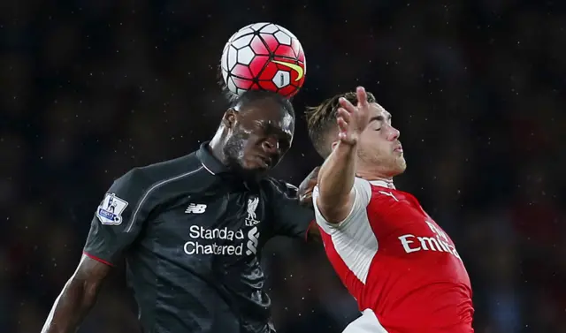 Christian Benteke rises against Callum Chambers