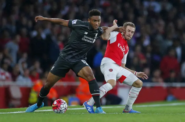 Joe Gomez battles for the ball