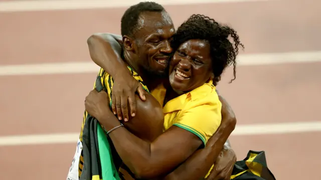 Usain Bolt hugs his mum