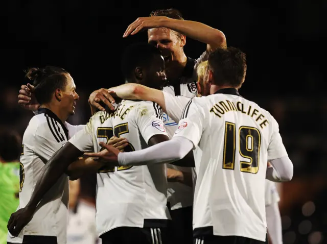 Moussa Dembele celebrates