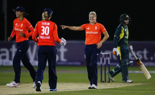 Erin Osbourne leaves the field after being dismissed