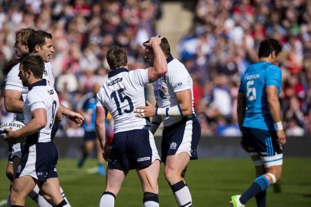 Sean Lamont celebrates his try for Scotland