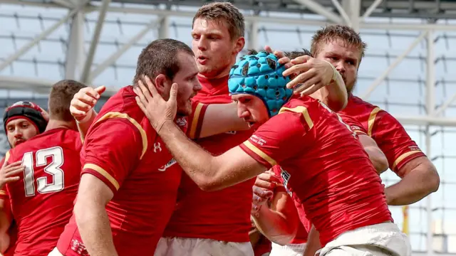 Wales players celebrate their opening try scored by Justin Tipuric