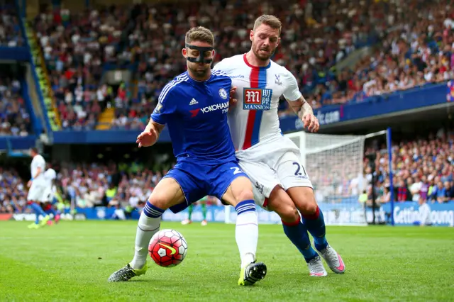 Gary Cahill and Connor Wickham compete for the ball