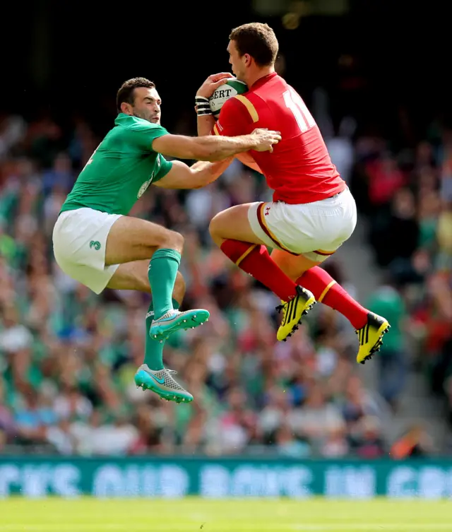 Ireland's Dave Kearney and Alex Cuthbert contest an aerial battle