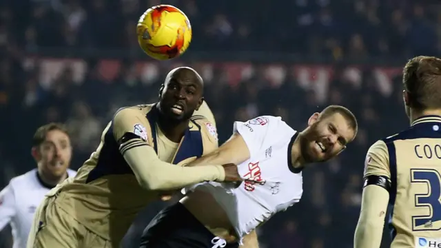 Jake Buxton wins a header for Derby against Leeds