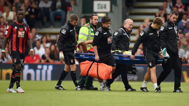 Tyrone Mings is stretchered off against Leicester