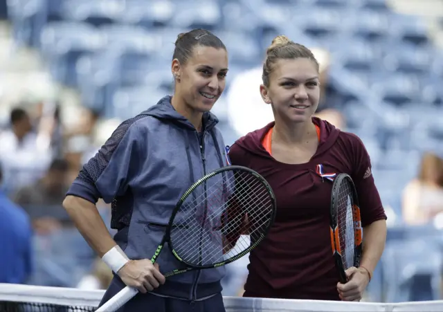 Pennetta and Halep at the net