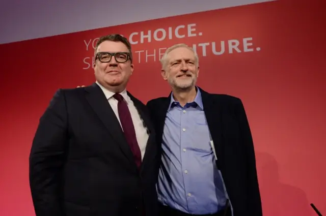 From left to right: Tom Watson and Jeremy Corbyn embrace after the result