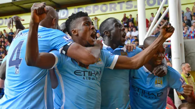 Man City players celebrate