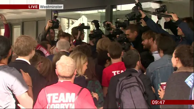 Jeremy Corbyn is mobbed by photographers and supporters on his arrival