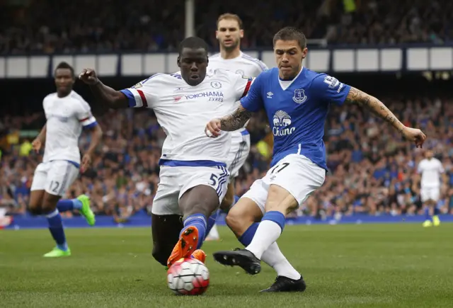 Besic and Zouma challenge for the ball