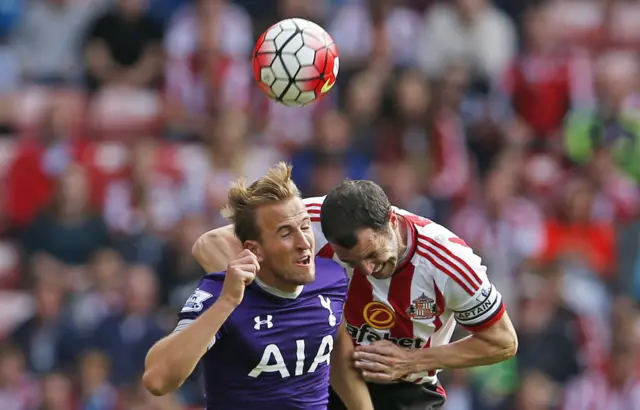 Harry Kane goes for the header with John O'Shea